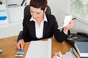 Active accountant checking receipts in her office-1