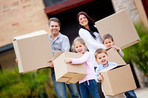 Happy family moving house and carrying boxes-1