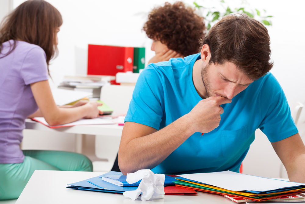 Male student during thinking about new solution